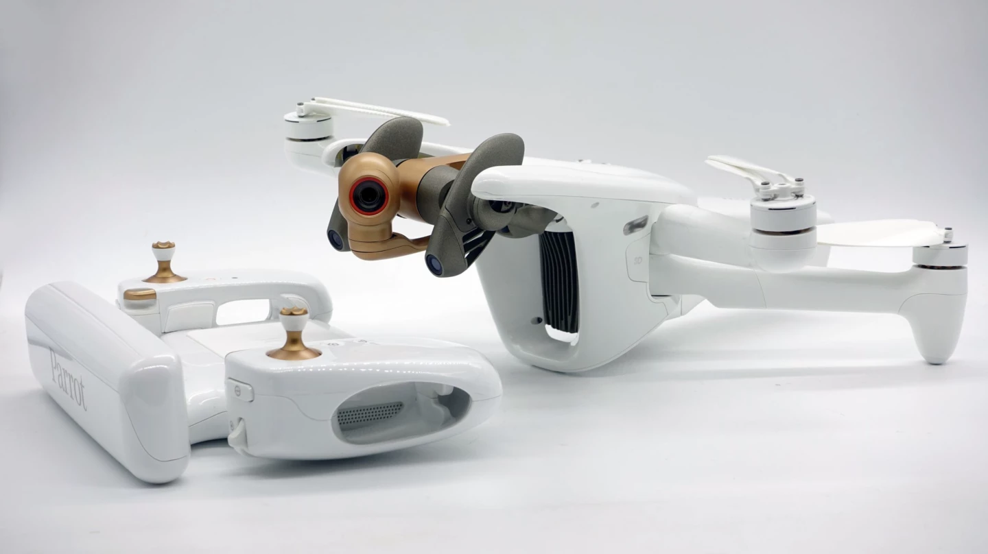 The Parrot ANAFI Ai and its included Skycontroller 4 remote – its swivelling "insect-inspired" stereoscopic obstacle-avoidance cameras are visible to either side of the main camera