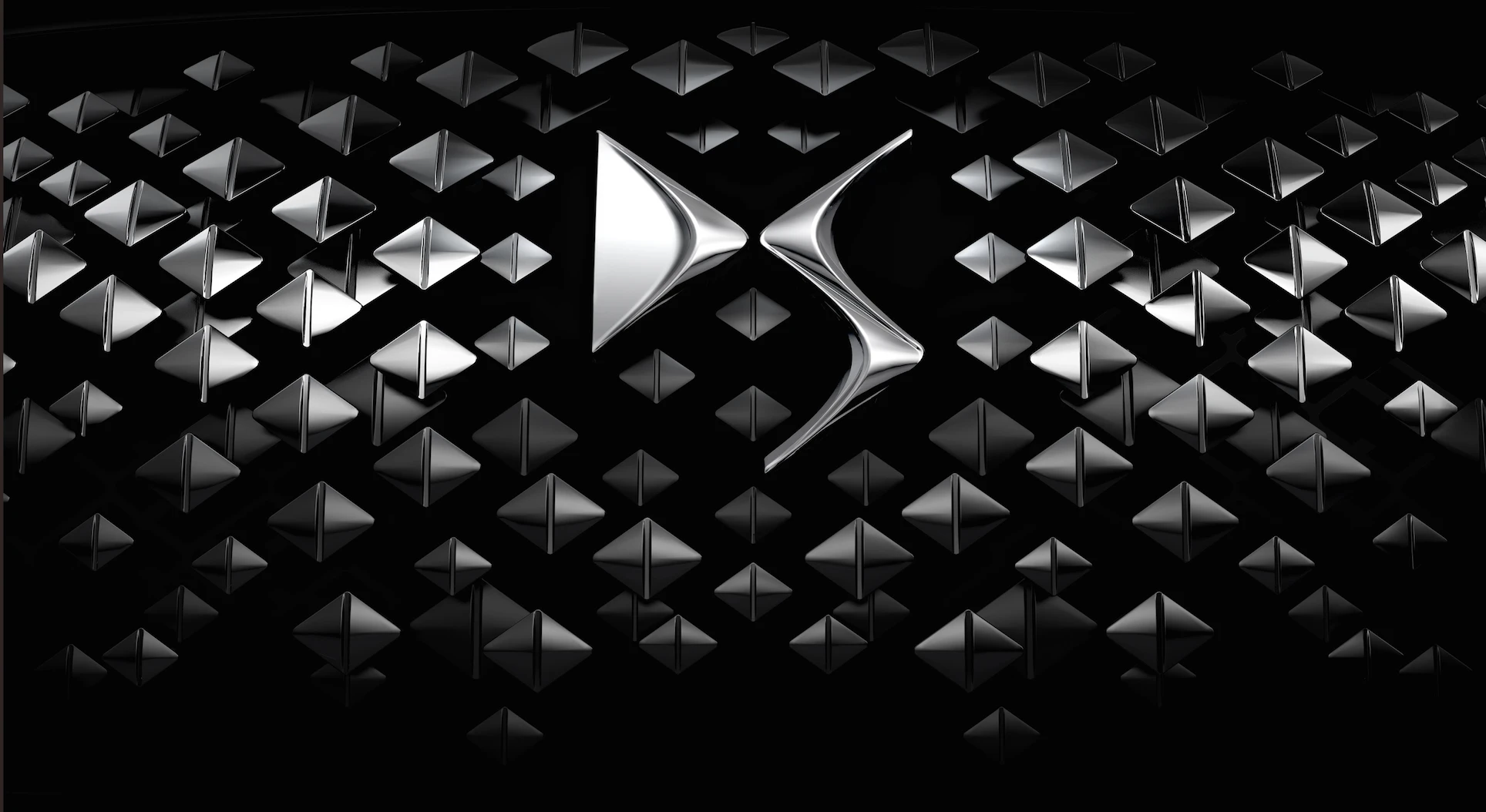 The diamonds on the grille surround a large DS badge