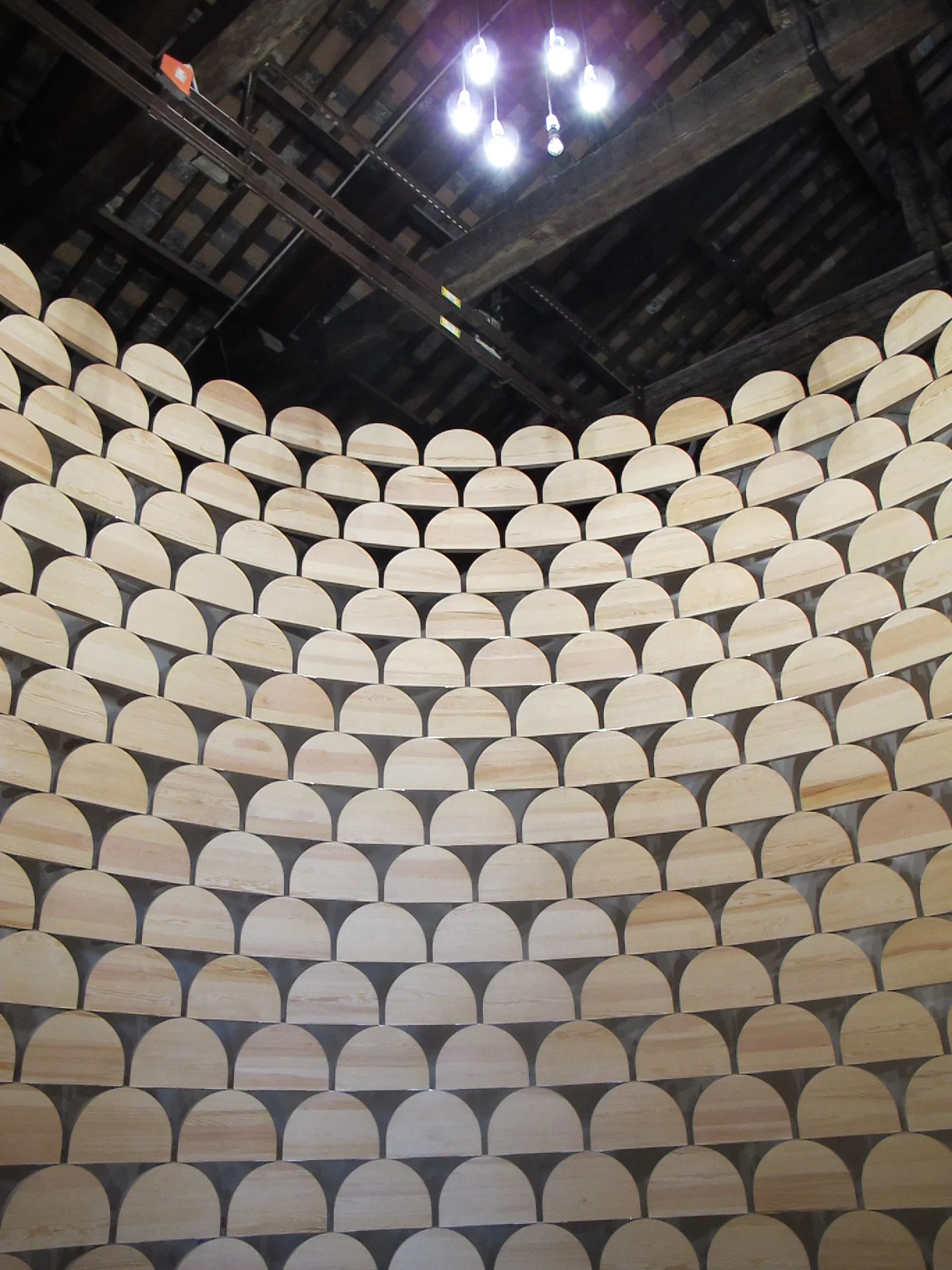 A wall made of low wooden stools from Kosovo (Image: Phyllis Richardson)