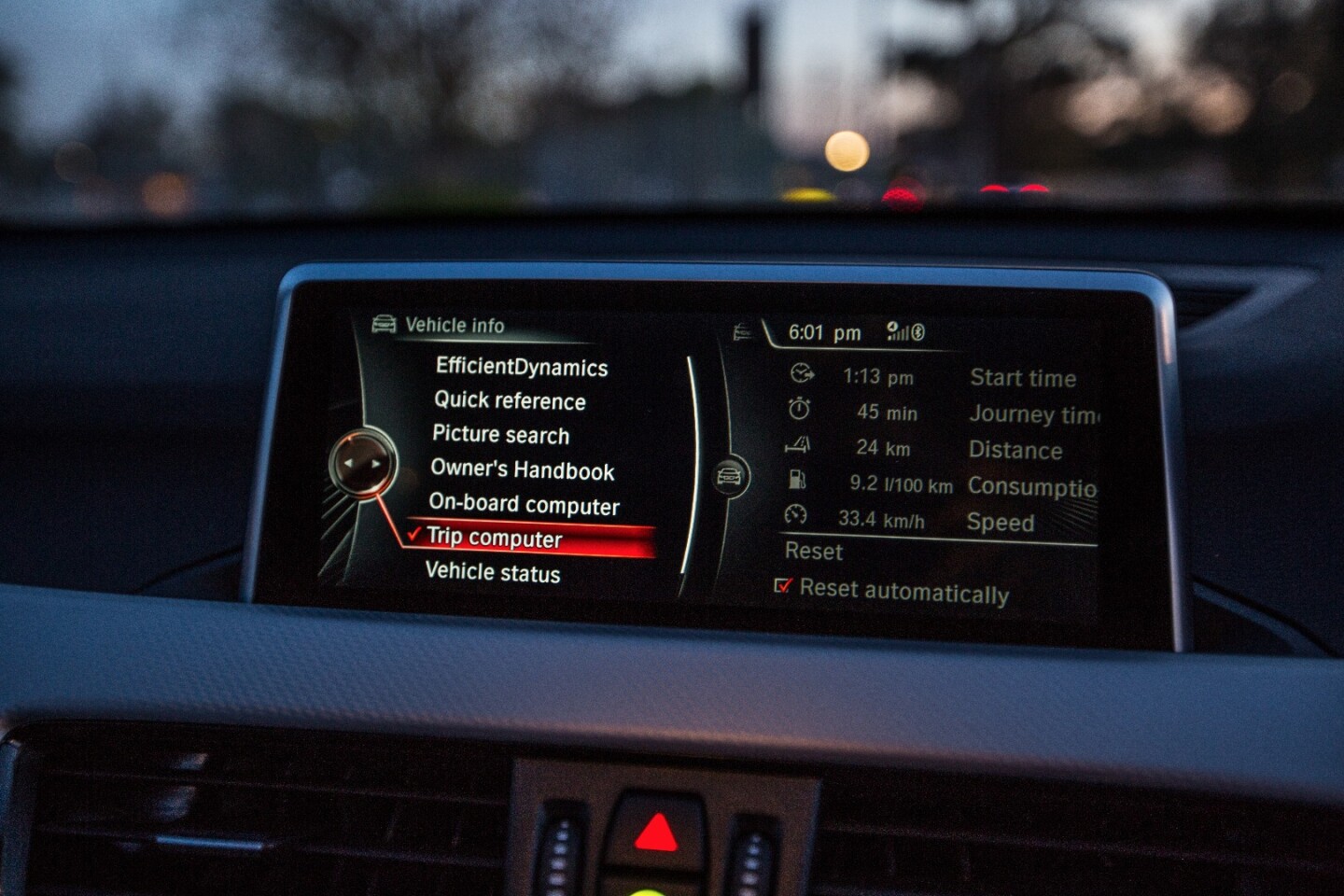 It's not a touchscreen, but iDrive's rotary controller is quick and easy