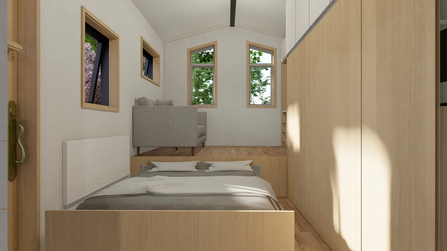 The Sakura's multipurpose room, shown with the double bed pulled out into position