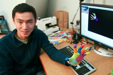 Researcher Robert Wang demonstrates the system