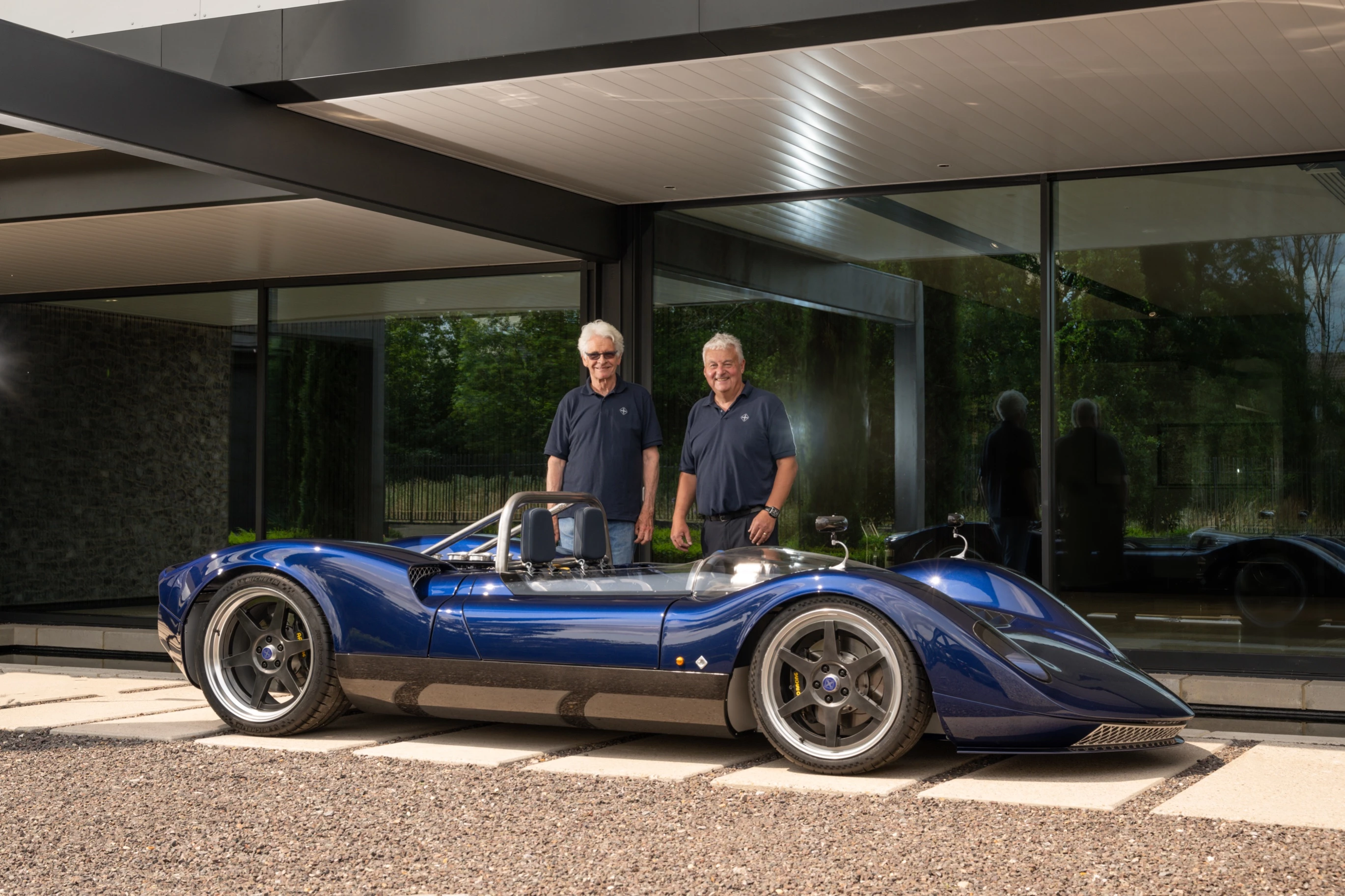 Steve Nichols, left, and Nichols Cars CEO John Minett pose with their production-ready creation