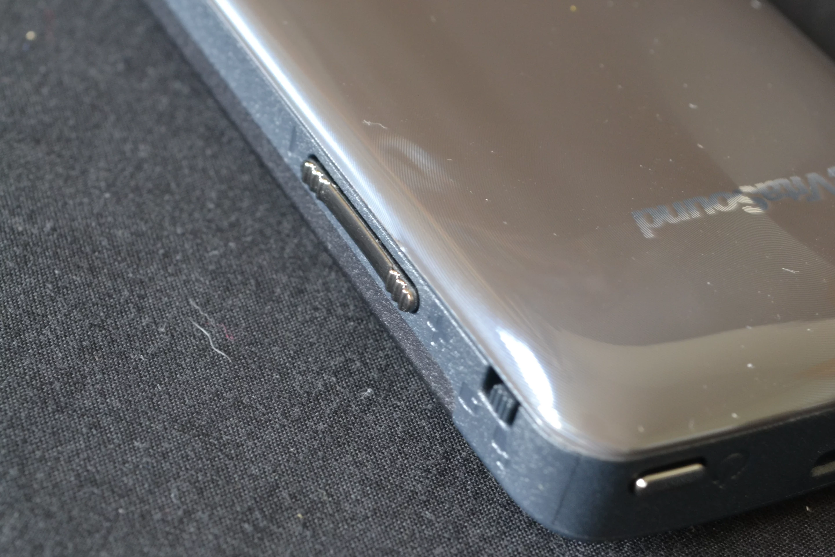 On the right side of the handset is a volume rocker and a lock button
