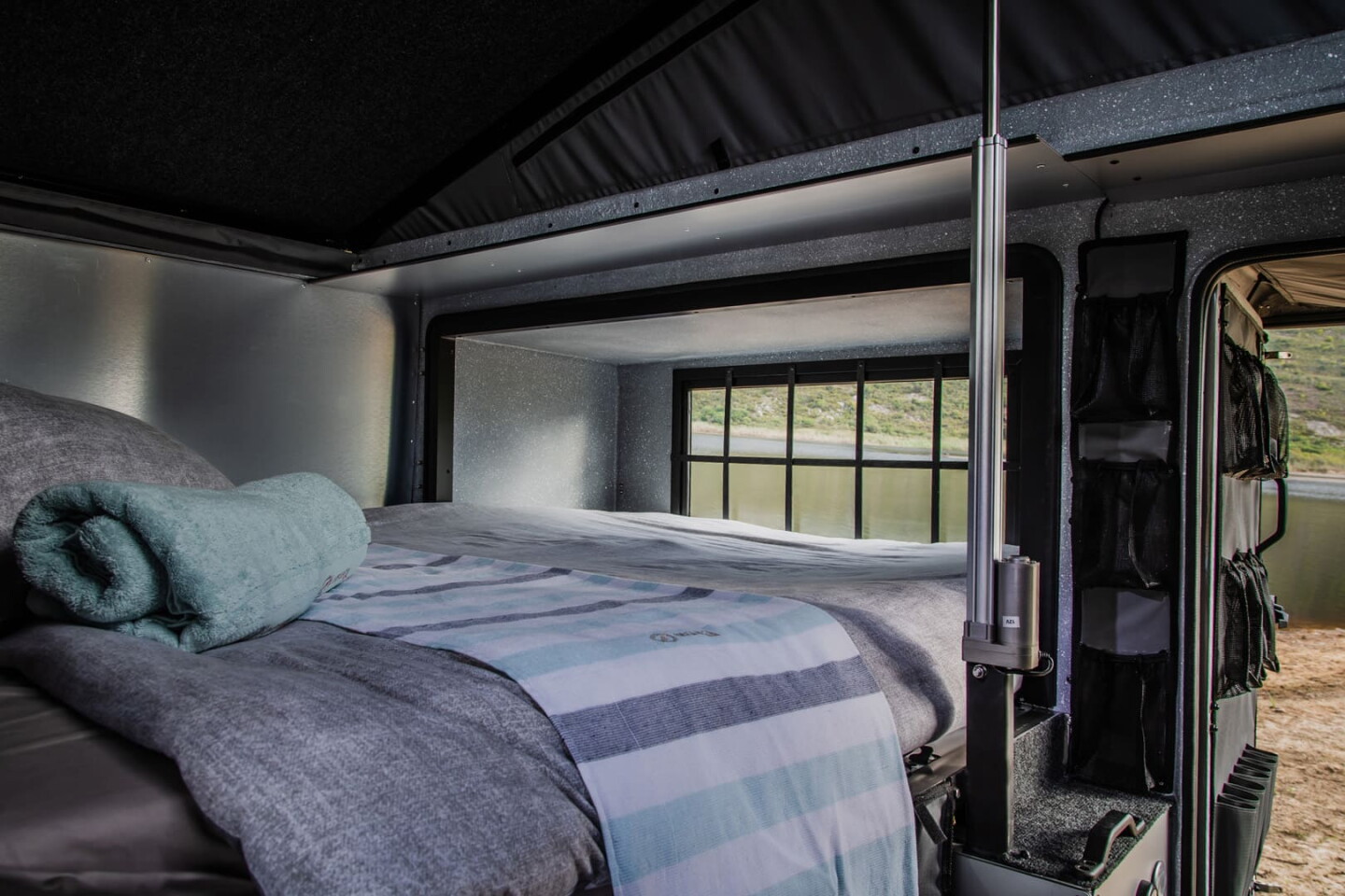 Inside, the Inkunzi has a double bed that folds out as the expansion slides