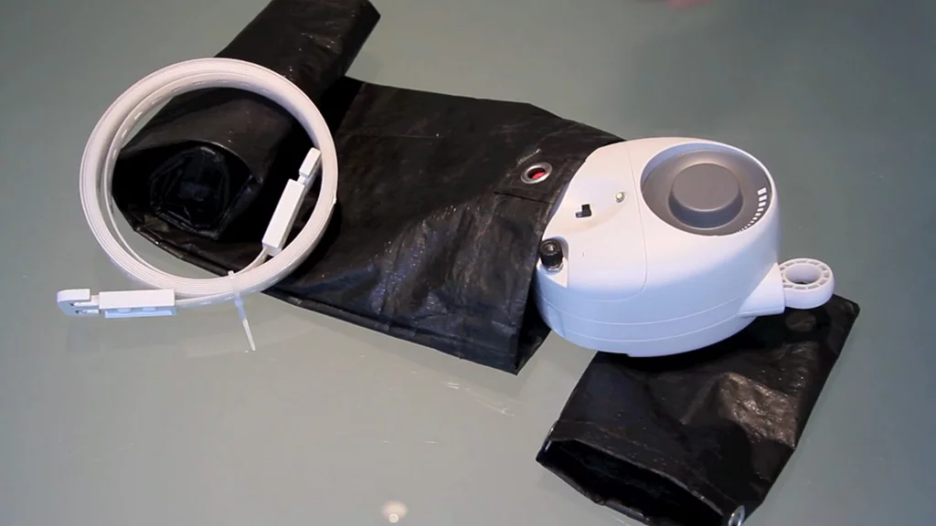 The GravityLight is delivered in a durable fabric bag that is filled with rocks or sand to form the weight