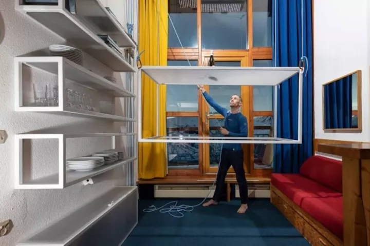 The "flying table" can be raised using pulleys between meals, and lowered for dinner