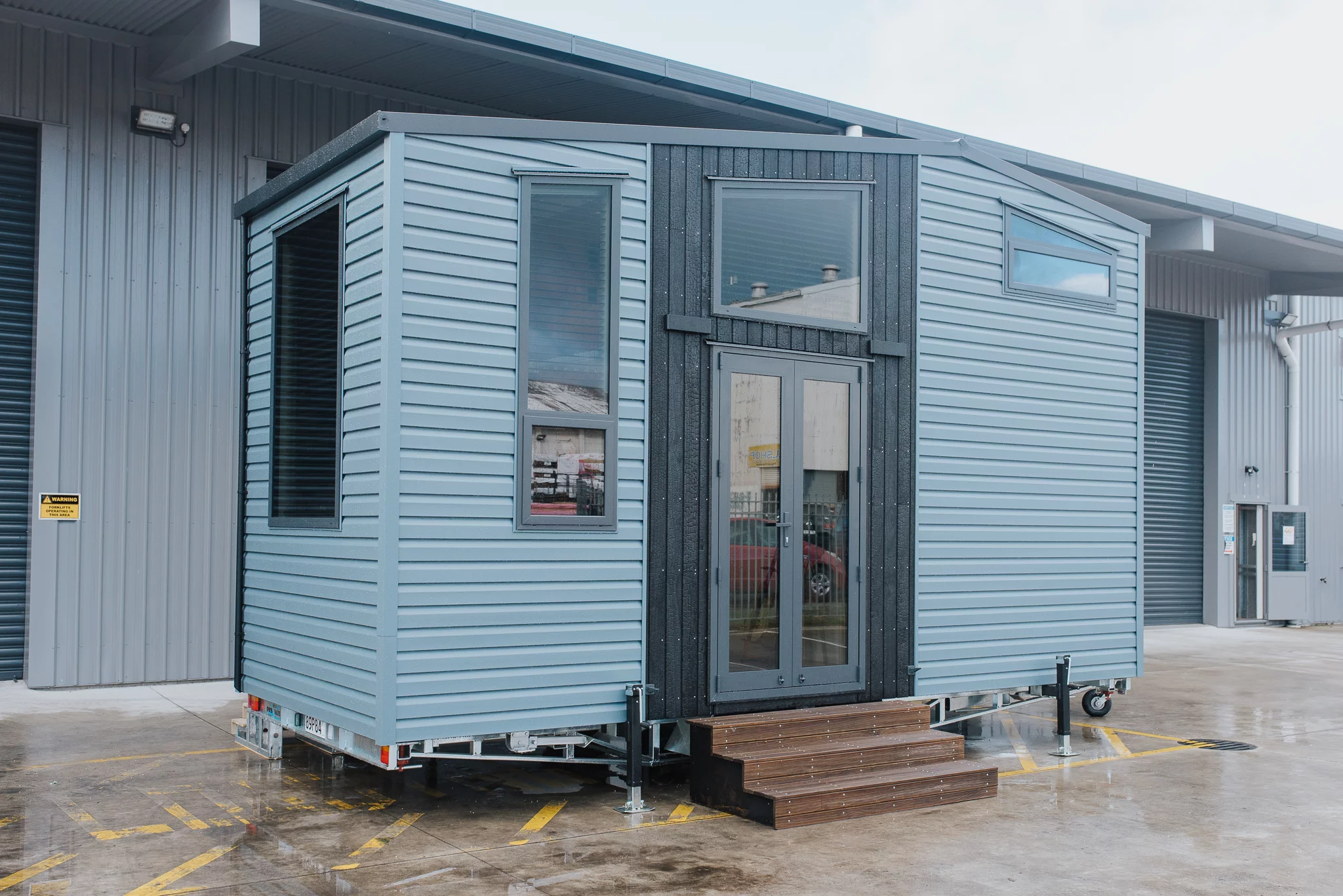 The Autumn's exterior is finished in vinyl, with Japanese Shou Sugi Ban-inspired charred wooden detailing