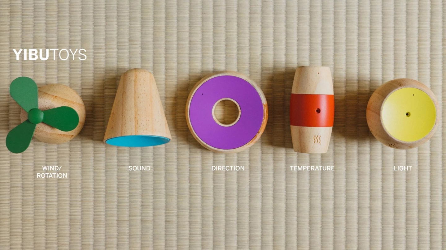 The platform includes five wooden toys, each of which has a different focus, those being sound, direction, temperature, light and rotation