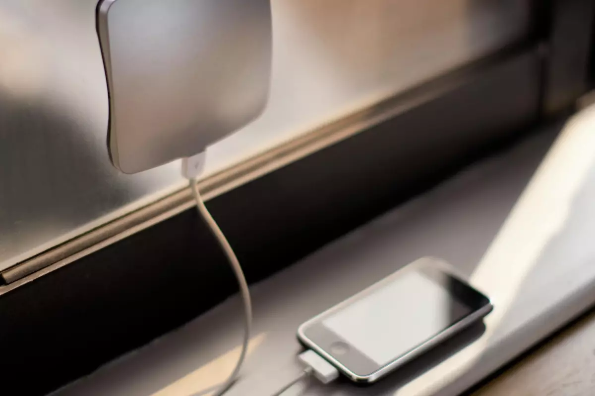 The XDModo Window solar charger sticks to the inside of a glass window pane so that the PV panel gets maximum exposure to the sun