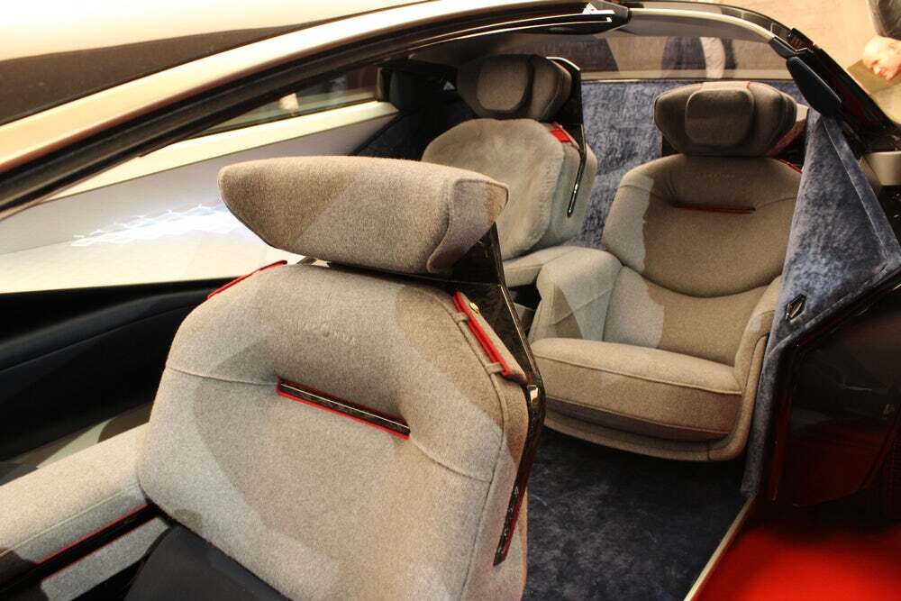 Aston designers experimented with unconventional materials inside the Vision Concept, including cashmere, ceramic tiles and silk