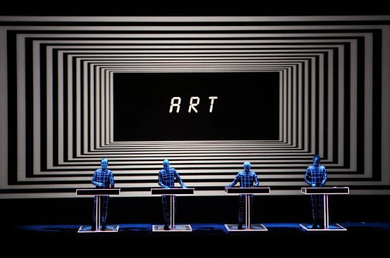 Archival images of a performance by the band Kraftwerk