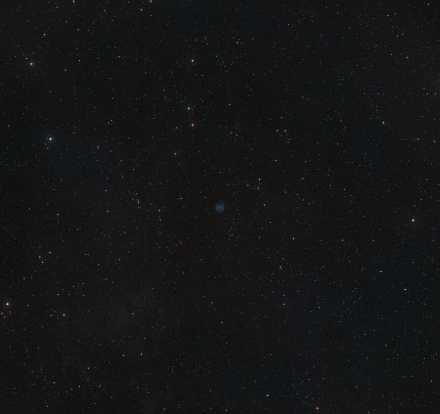 A composite view made from exposures collected for the Digitized Sky Survey 2 showing the region surrounding ESO 577-24, which can be found in the center of the image