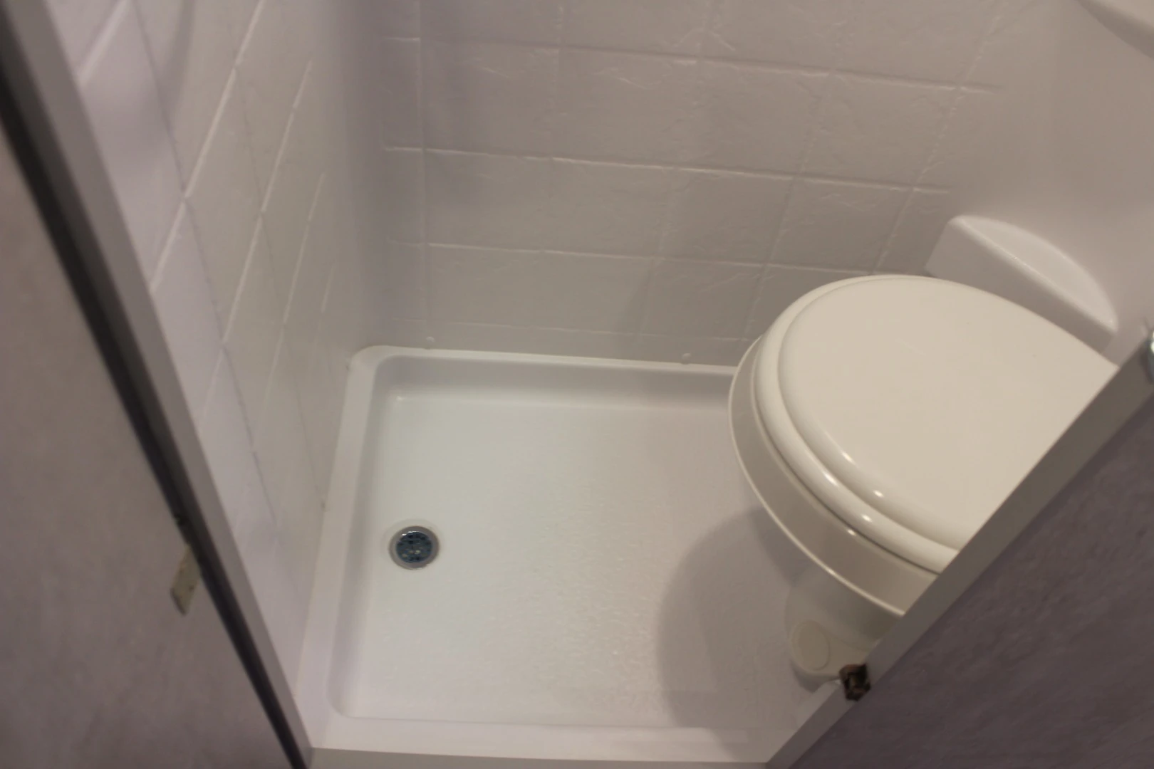 Simple wet bath inside the Evoke trailer