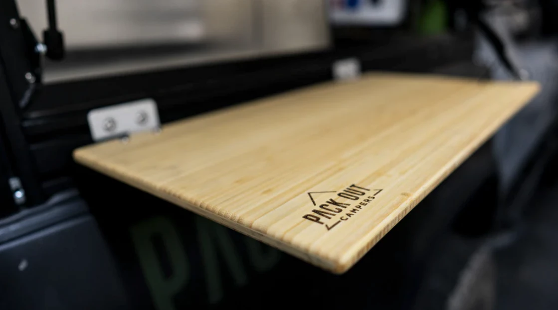 Packout's drop-down table works for food prep, holding a stove or coffeemaker, etc.