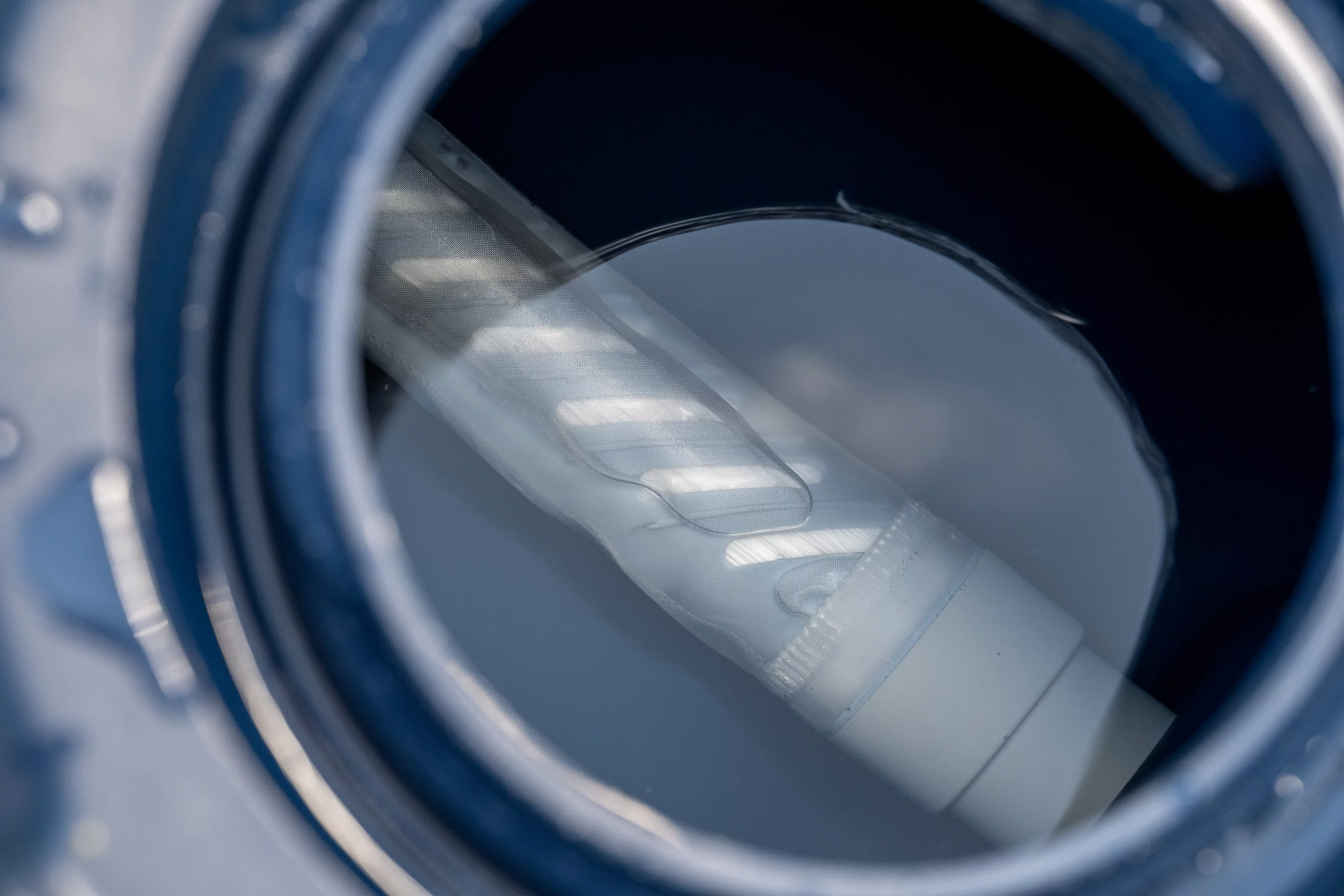 The pumped pressure sends water flowing through the multi-filter tube and out the spout