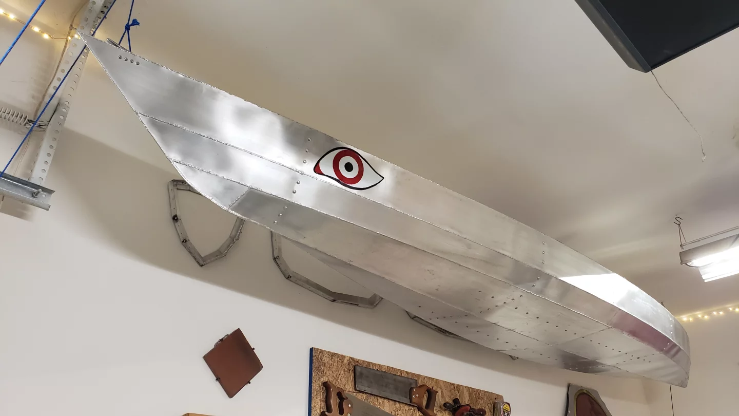 The completed kayak sports a spiffy brushed aluminum finish – along with a pair of ancient-Greek-trireme eyes