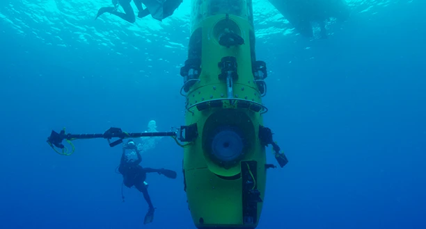 The DEEPSEA CHALLENGER with one of its utility booms deployed (Photo: National Geographic/DEEPSEA CHALLENGE)