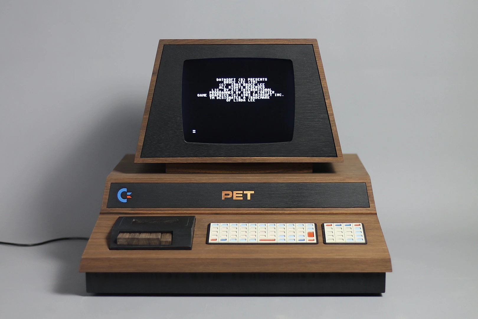 The metal box of the original PET 2001 computer has been replaced by American walnut