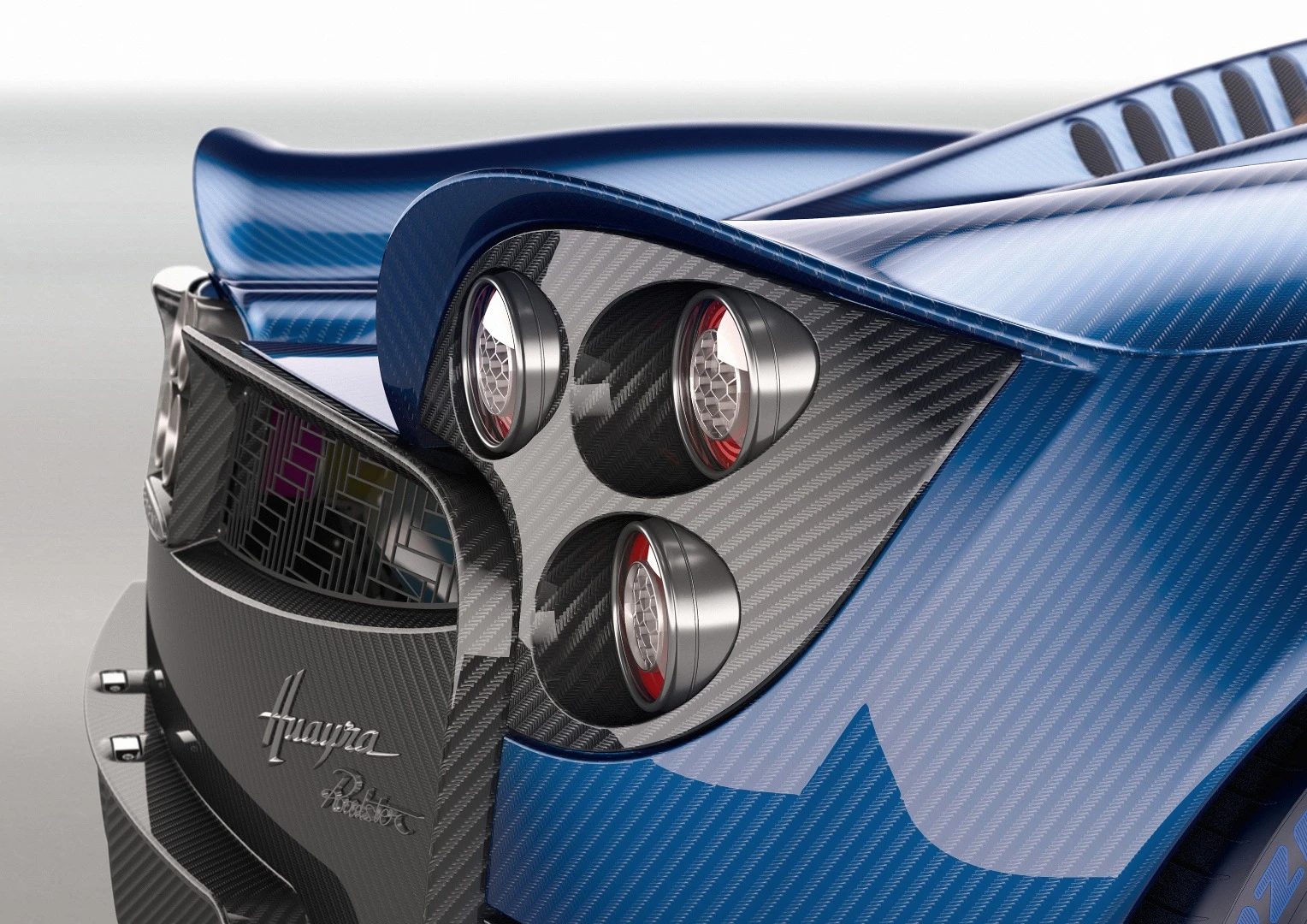 The rear of the Huayra is absolutely gorgeous, especially in blue and carbon