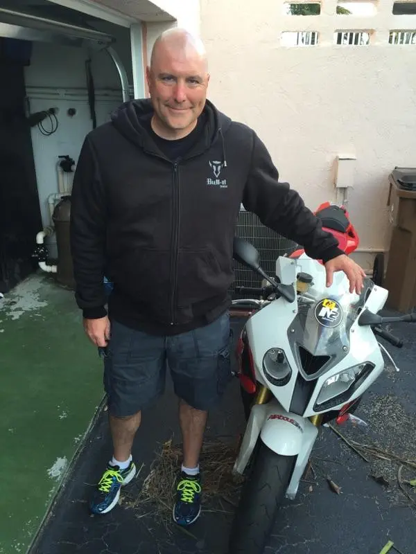 Greg White of Greg's Garage TV models a Bull-it Jeans hoodie