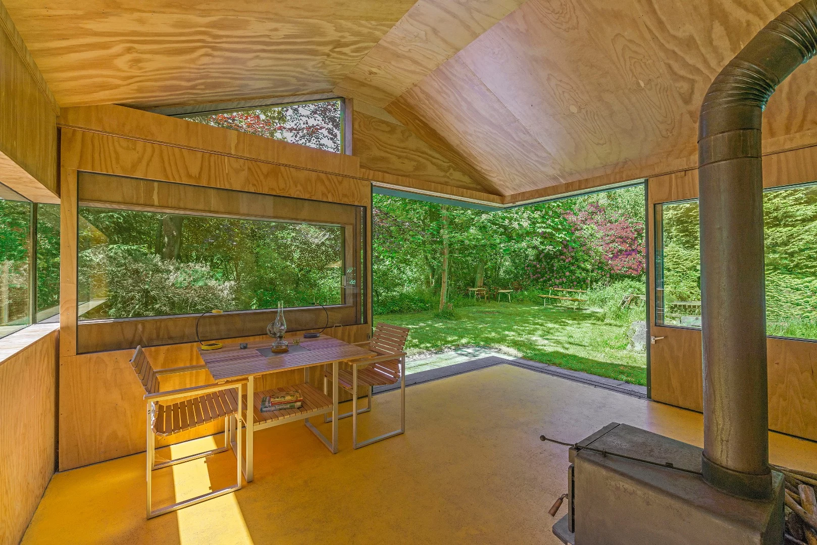 The interior is dominated by uncovered wood