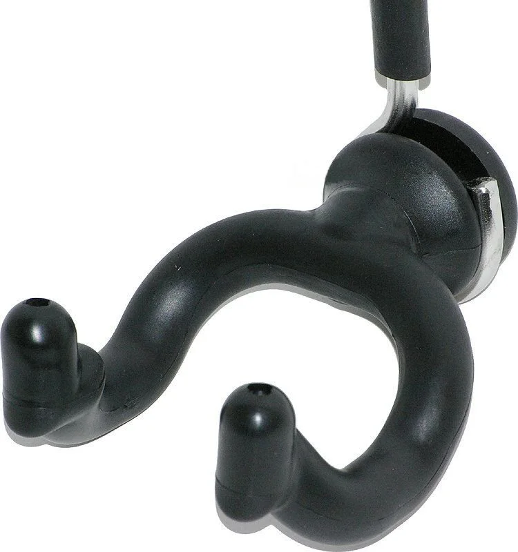 The U-shaped bracket is wide enough for the neck of a guitar to slide through but not the instrument's headstock