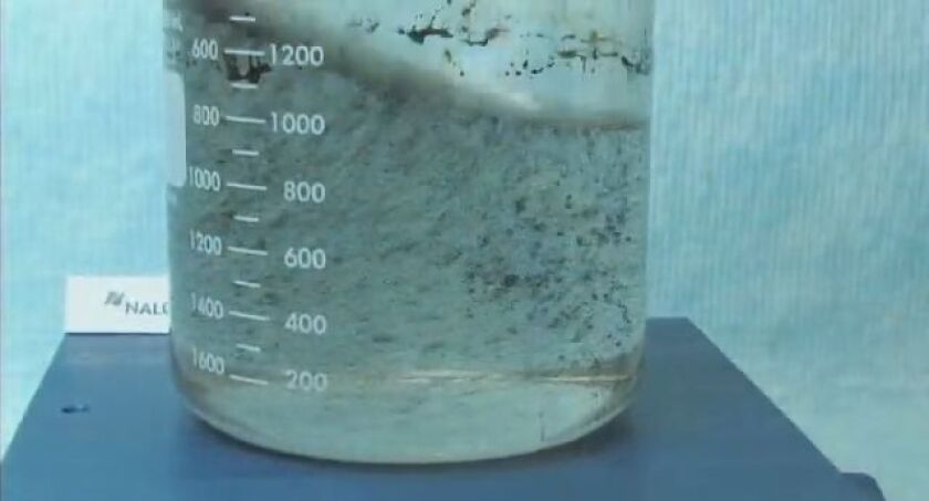 Nalco's COREXIT being tested in a lab