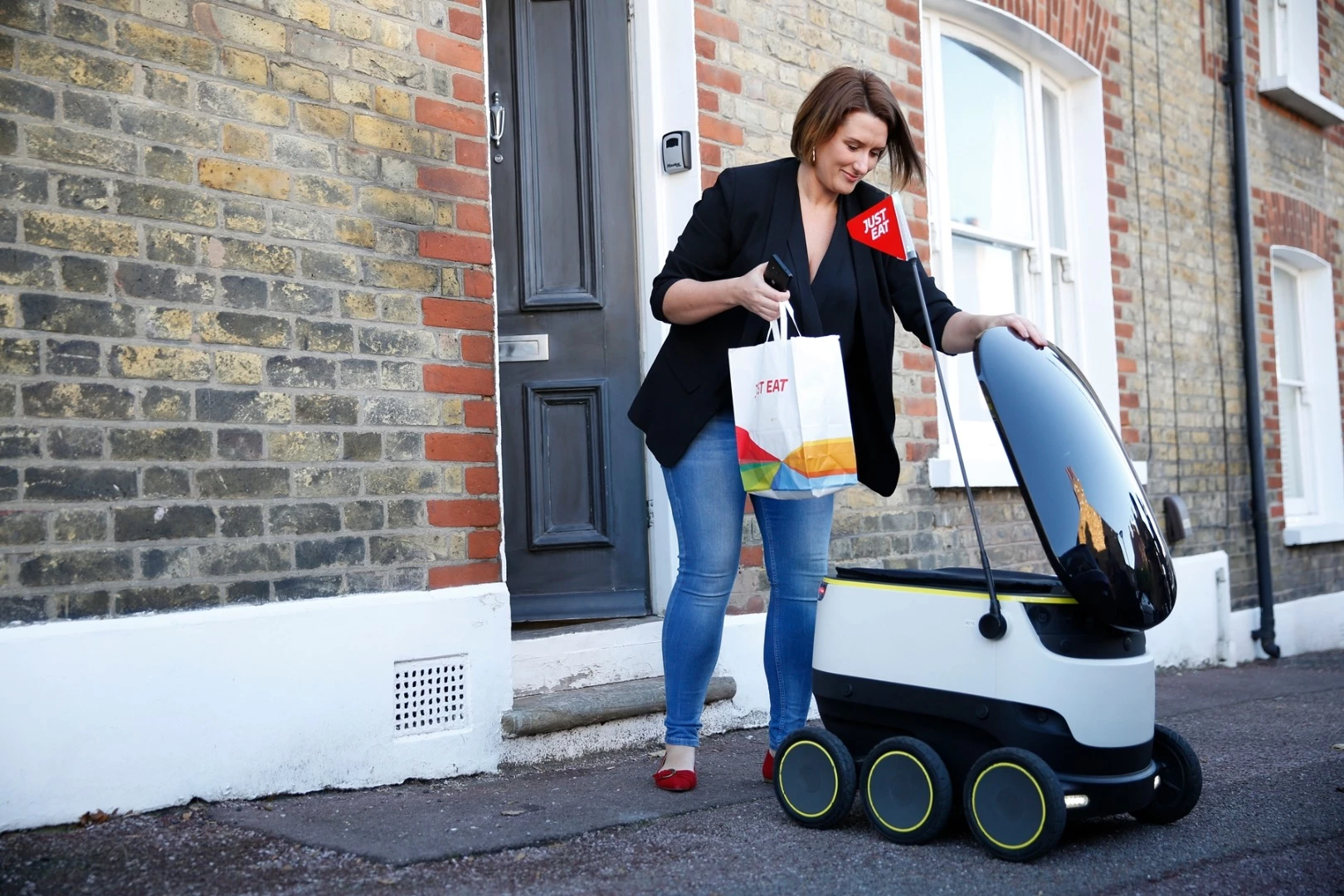 The Just Eat customer who received the robot-delivered order was sent a unique link for accessing the cargo hold on her phone