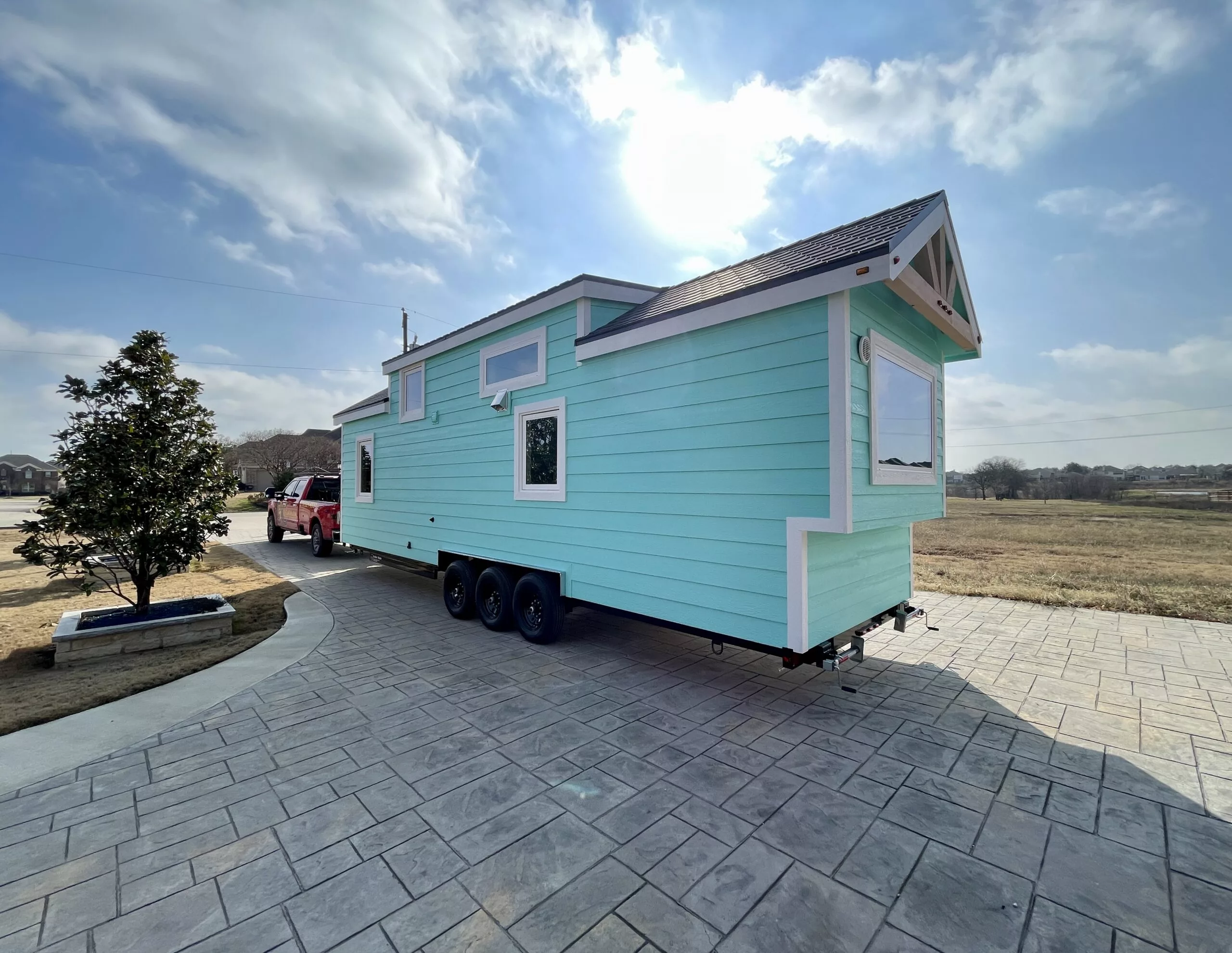 The Lady Bird is based on a triple-axle trailer and its exterior is finished in smart siding