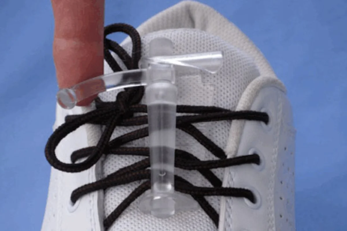 Lace-amatic helps with tying and tightening laces and makes slipping on and off laced-up shoes a little easier
