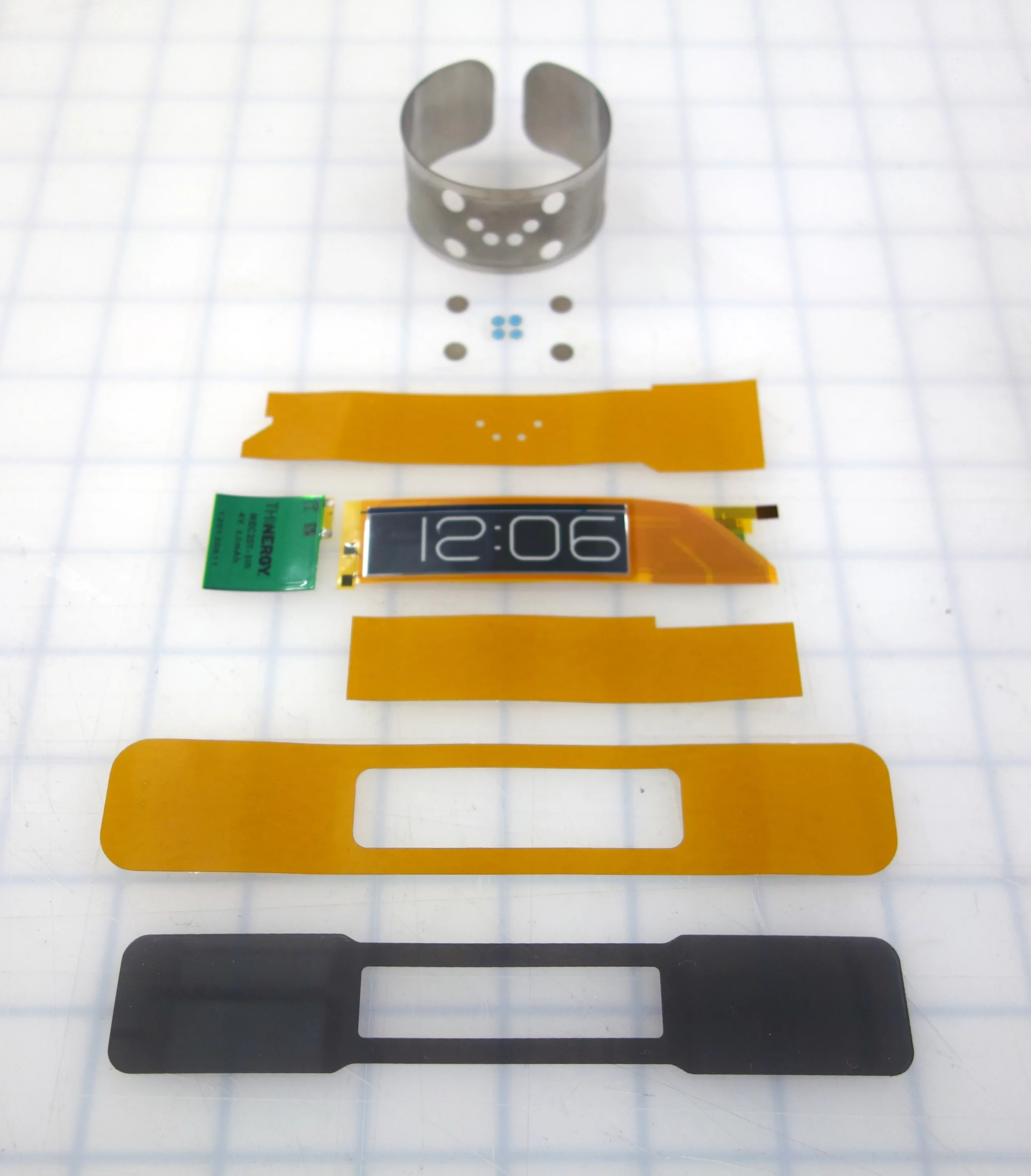 An exploded view of the CST-01 e-ink wristwatch