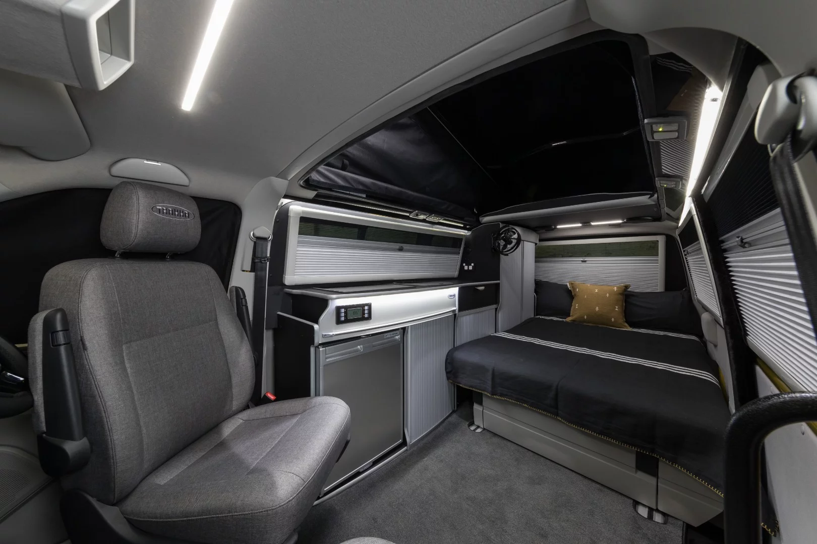 The Trakkadu 450 S sleeps two standard on the folding seat bed and another two optionally with the available roof bed
