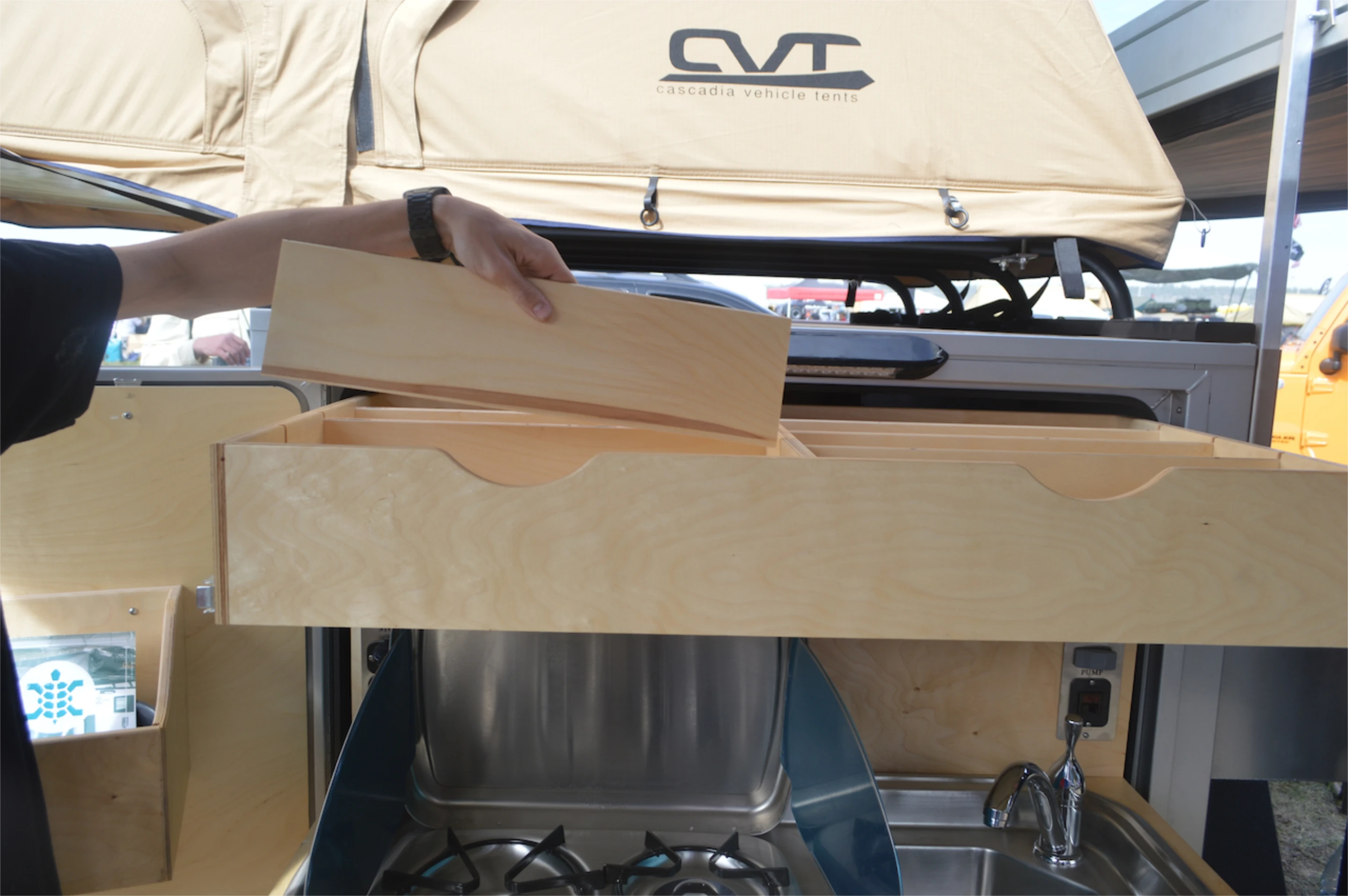 The upper dry pantry has adjustable dividers