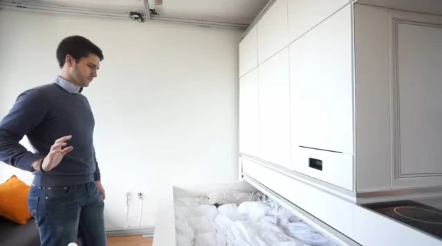 The bed can be drawn out of its hiding space using predetermined hand gestures