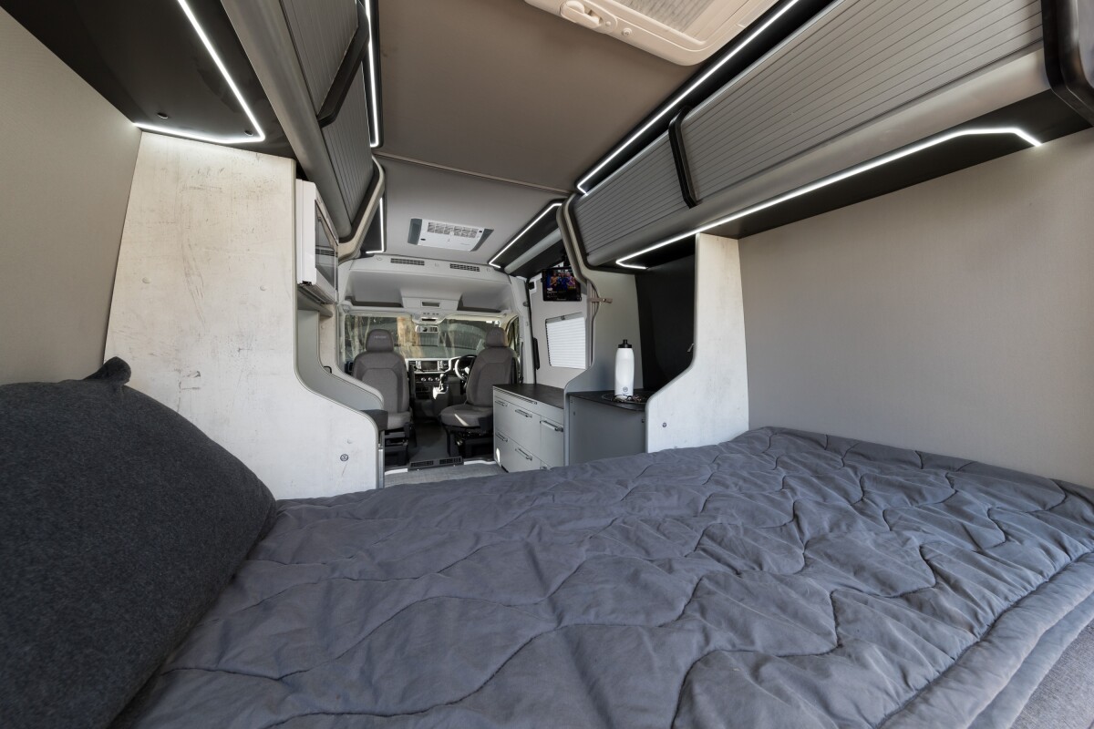 The combination of overhead lockers and cabinets provides plenty of storage