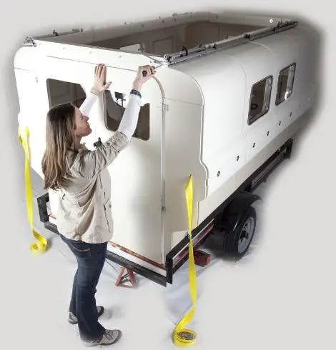 Attach the panels, doors and pop-top roof to make the full camper