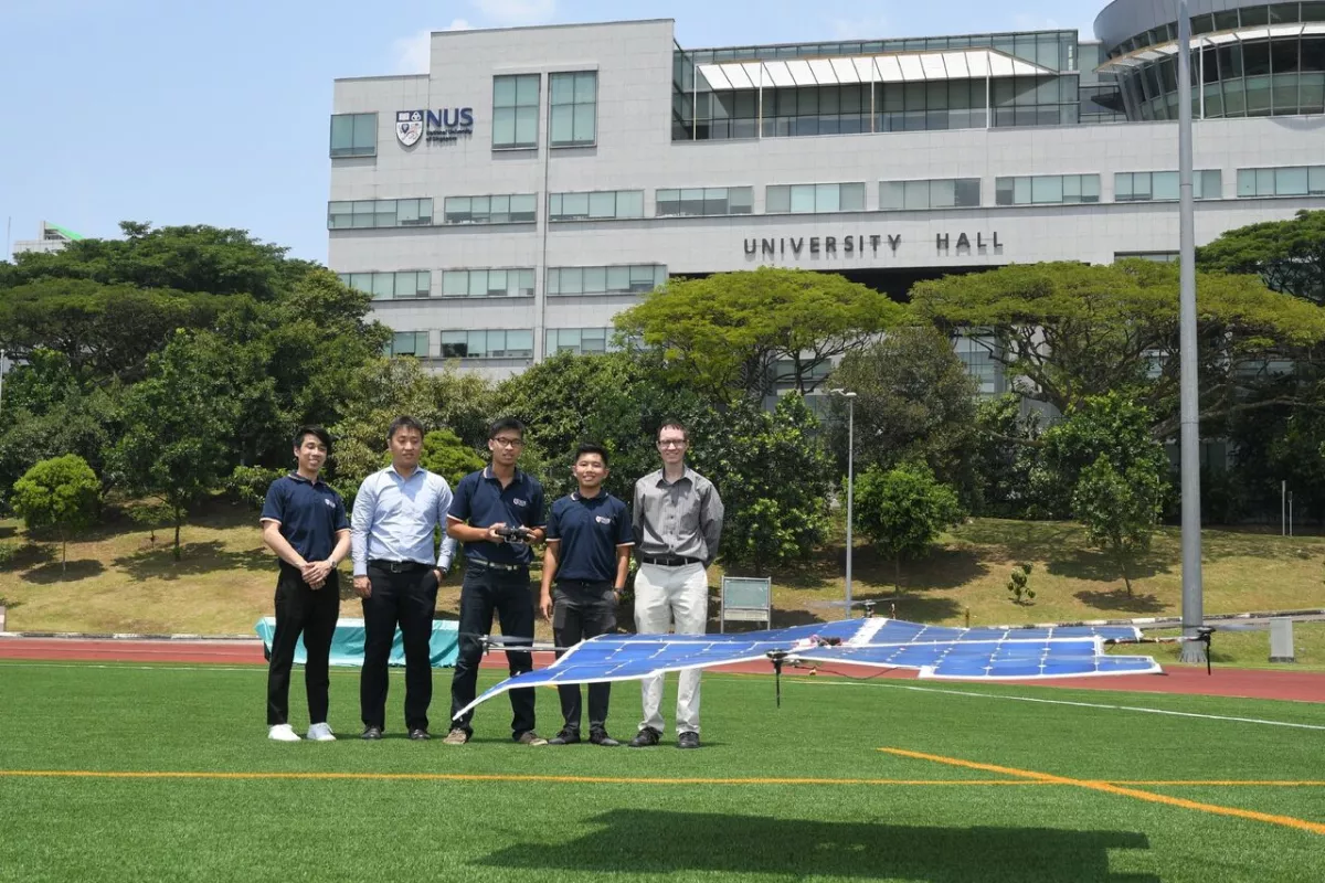 Aaron Danner (right) and his student team, with the solar-powered drone