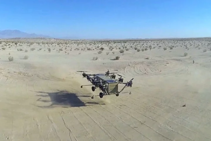 Snapshot from aerial footage of the aircraft in hover filmed by a quadcopter drone