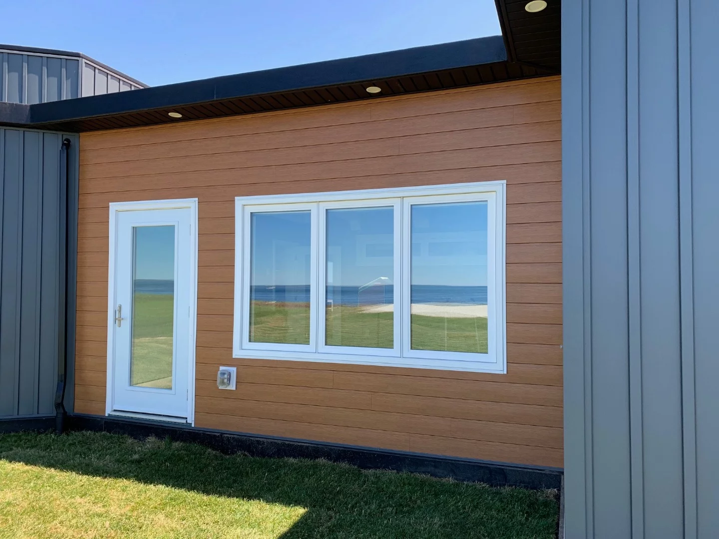 These panels were made by melting down approximately 612,000 recycled plastic bottles