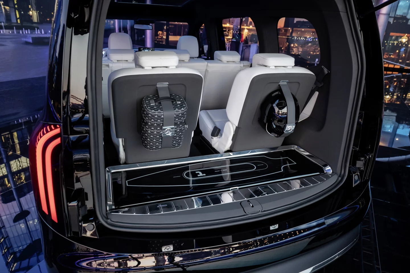 Adding some last-mile flexibility, Mercedes gives the Concept EQT a neatly stored electric longboard