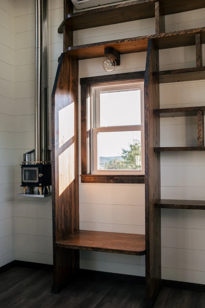 The Silhouette's reading nook, next to a small wood-burning stove