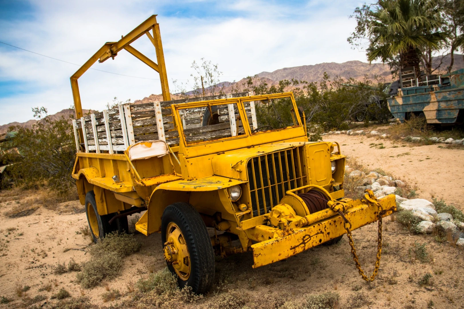 There are vehicles of all sorts, including this utility vehicle with a winch and hoist scaffolding attached, at the Patton Tank Museum