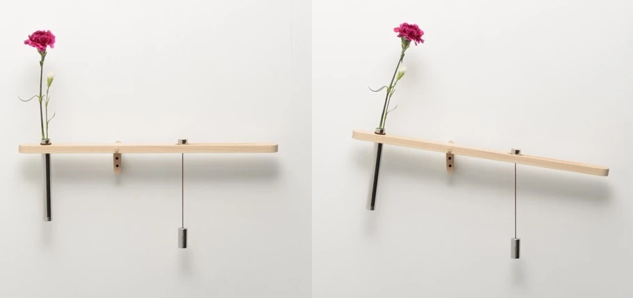 Water Balance offers a visual reminder to feed your houseplants, by visibly showing how much liquid has evaporated from a vase of flowers