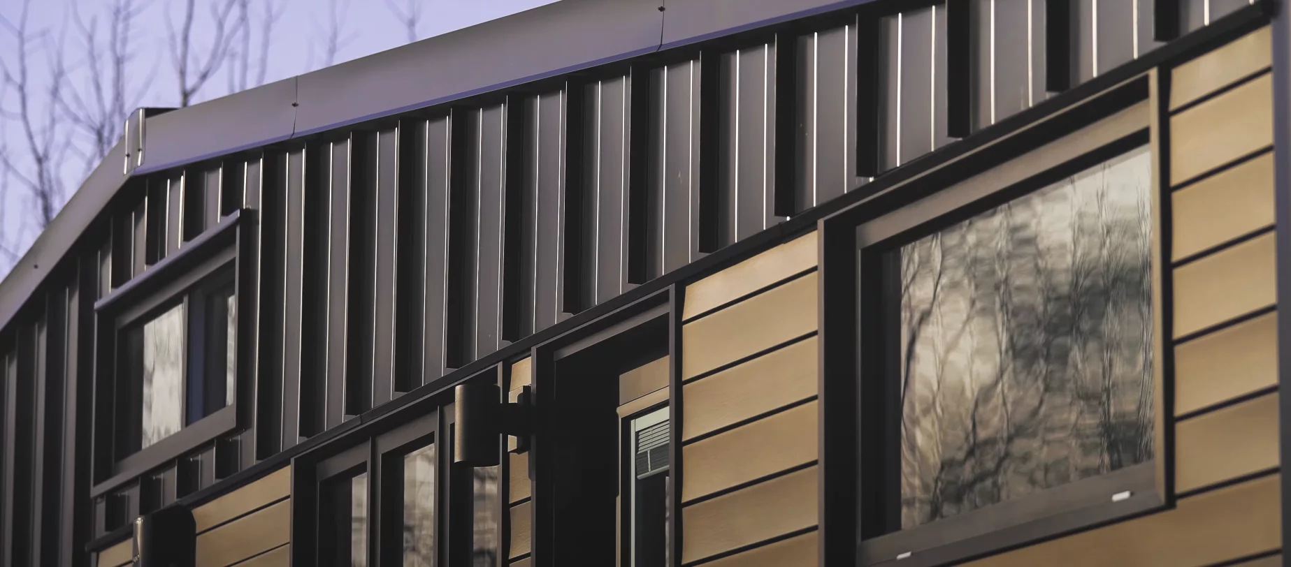 The 2024 Noyer XL is finished in horizontal cedar and vertical steel