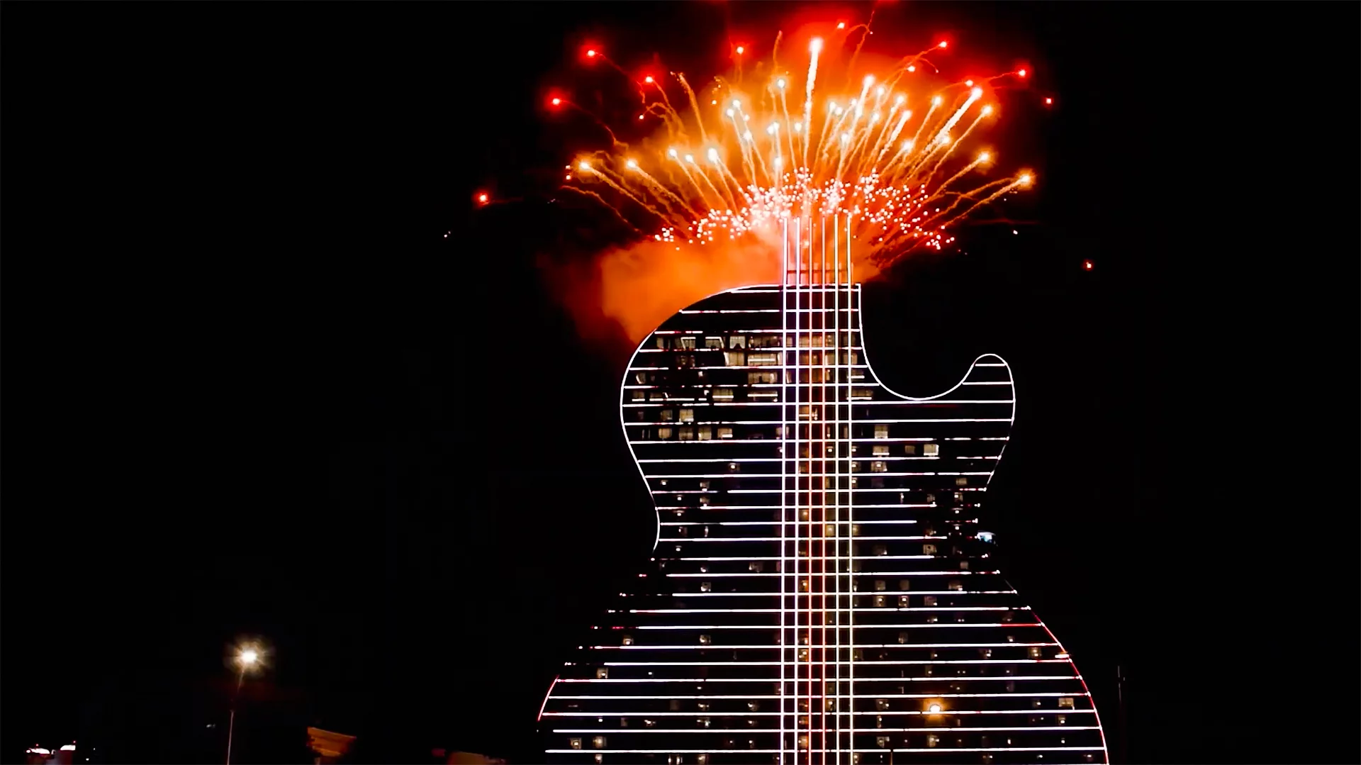 Fireworks are launched from the roof of the Guitar Hotel during the grand opening in October