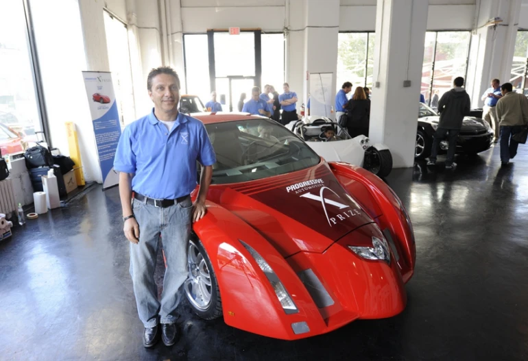 ZAP CEO and team leader Steve Schneider with the Alias which has made it through to the next round. This Alternative Class entry in the X Prize competition is expected to have a 150-165 MPGe with a top speed of 75mph