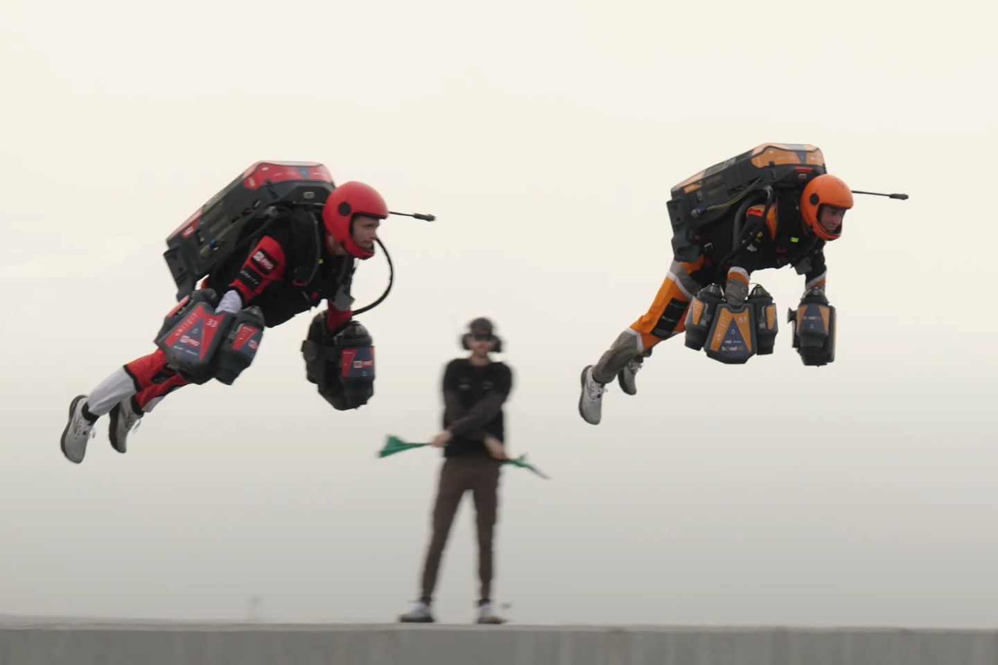 The starter's flag is still coming down and both pilots are already airborne