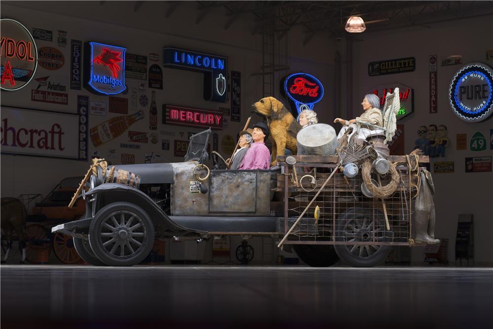 The truck from the Beverley Hillbillies, driven by Buddy Ebsen. One of five built for the series' ten year run, and was also used in the movie of the same name. The truck wasoriginally based on a 1922 Oldsmobile truck base. It was sold in Scottsdale for US$275,000 by Barrett-Jackson in January, 2015.