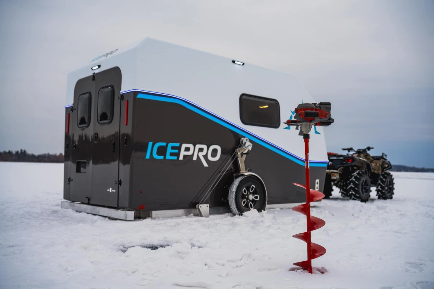 The IcePro trailer is meant to carry the ATV on the road, then ride behind it on the ice